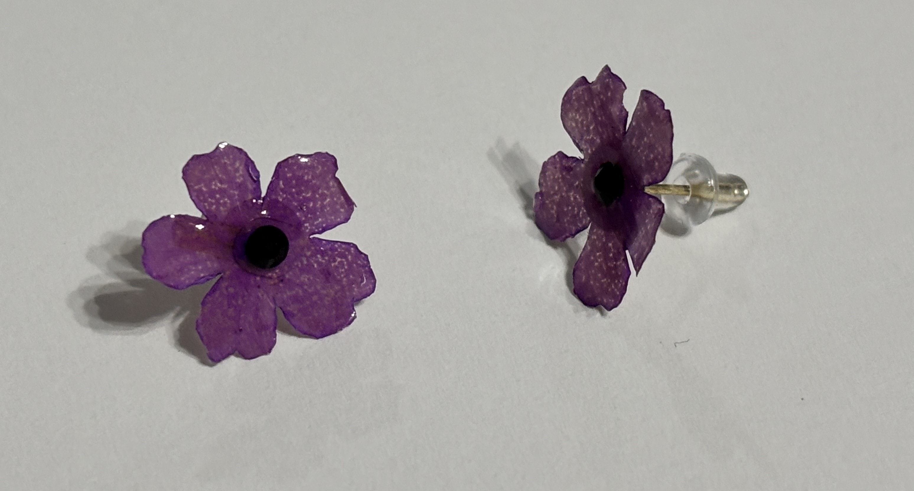 Handmade purple flower stud earrings made with resin